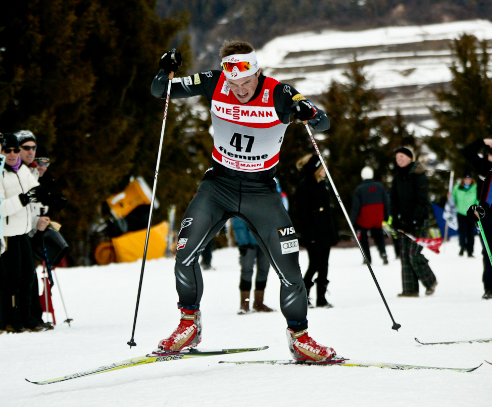 American Men Plug Away in 35 k Despite Obstacles; Newell Breaks Two Poles