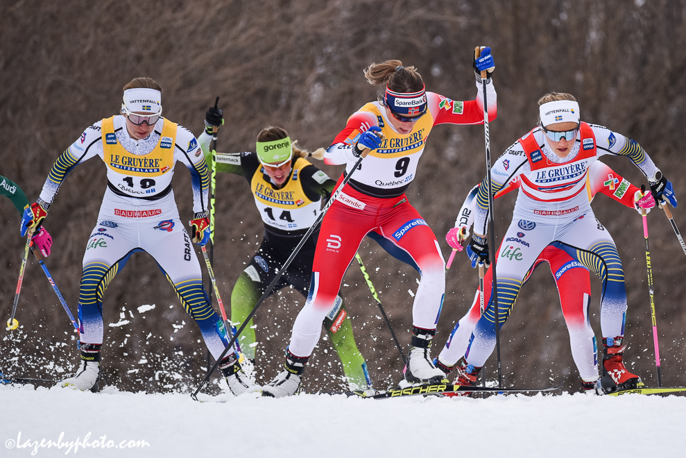 Maiken Caspersen Falla (#9) leads the third quarterfinal. Stina Nilsson (red bib) and Falla moved on to semis. (Photo: John Lazenby)